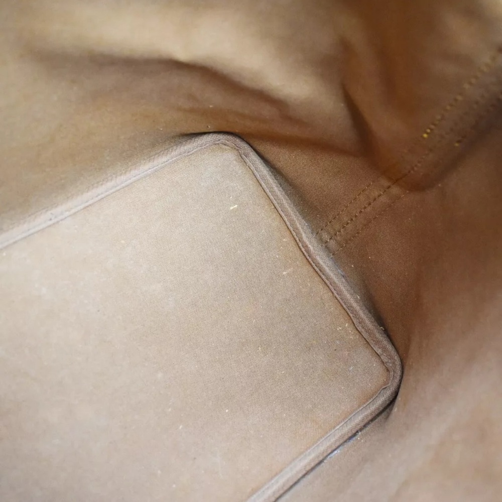 Louis Vuitton Monogram Drawstring Bucket Bag in Brown and Tan - Picture 14 of 14